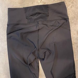 Athleta Stealth leggings with mesh inserts